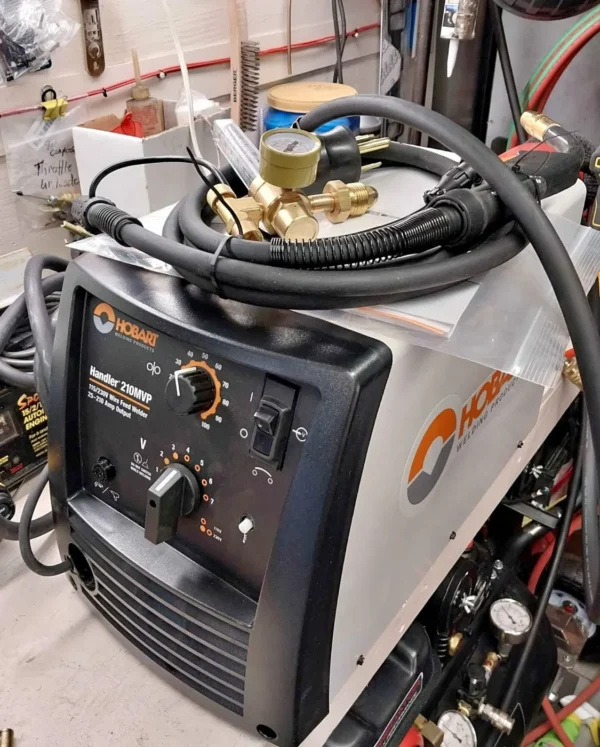 Brand New Hobart Handler 210MVP MIG Welder – Dual Voltage, Spool Gun Ready – For Sale at Meldverse